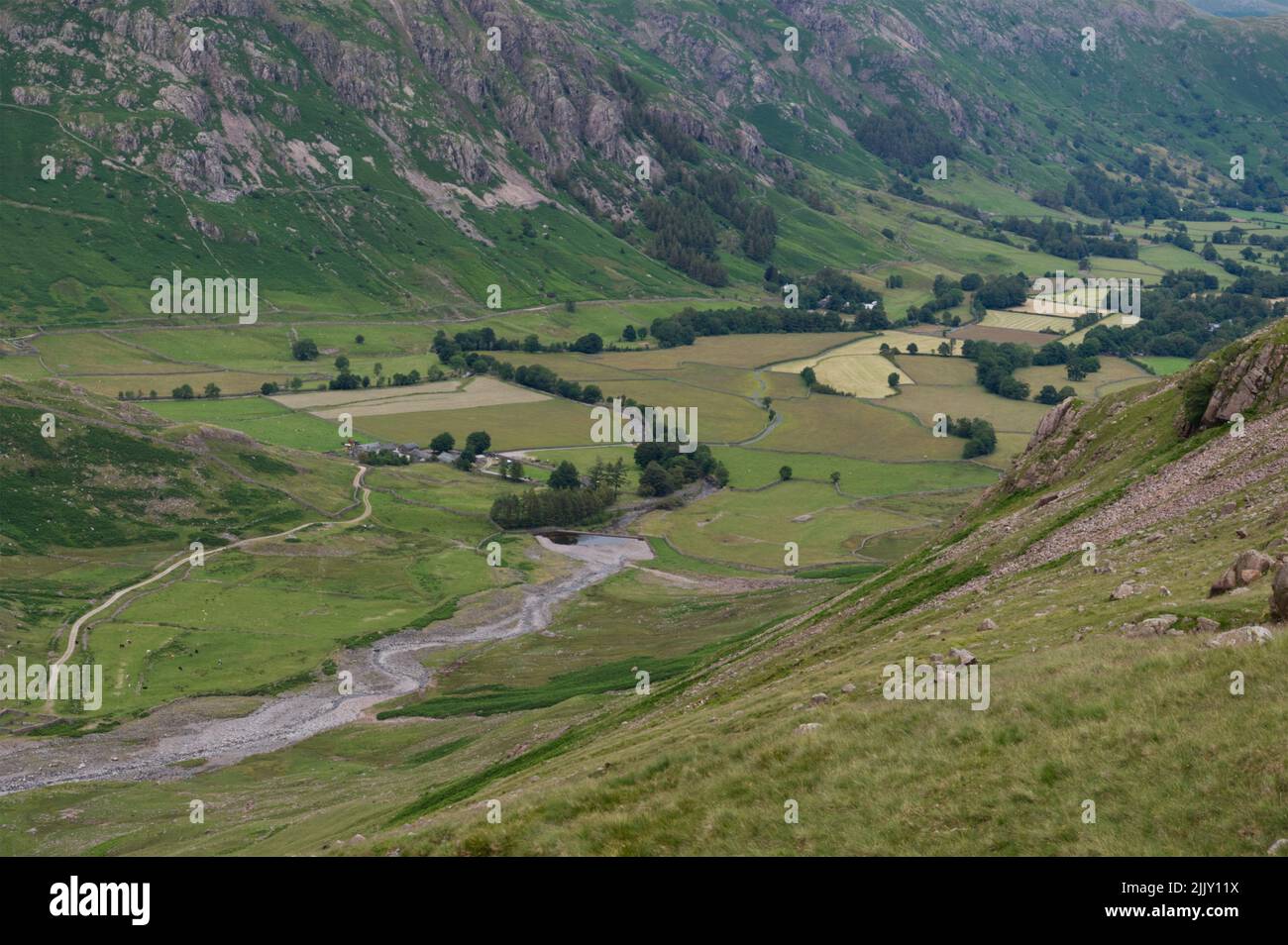 Descending into Oxendale to Stool End in the Great Langdale valley, Lake District National Park. Stock Photo