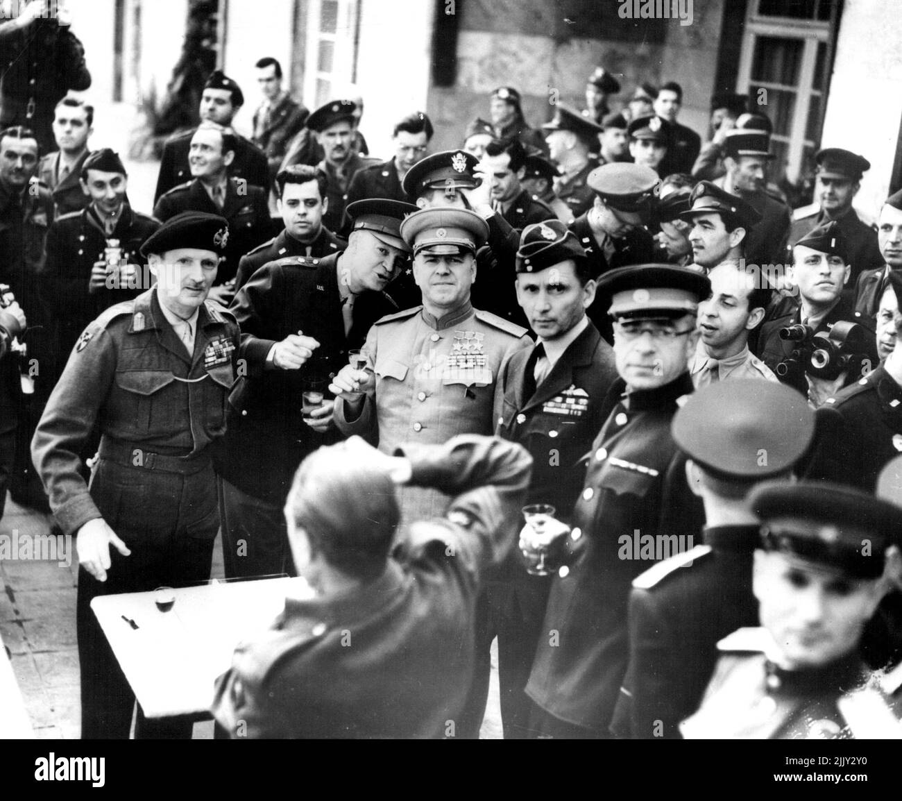 Twilight Of The Nazis - Allied leader meet in Frankfurt to toast the victory of Germany after the signing (May 7, 1945) of the German surrender. Left to right are: Field Marshall Bernard Montgomery; General Dwight D. Eisenhower; Soviet Marshal Gregori Zhukov; and British air chief Marshal Sir Arthur Tedder. May 4, 1955. (Photo by United Press). Stock Photo