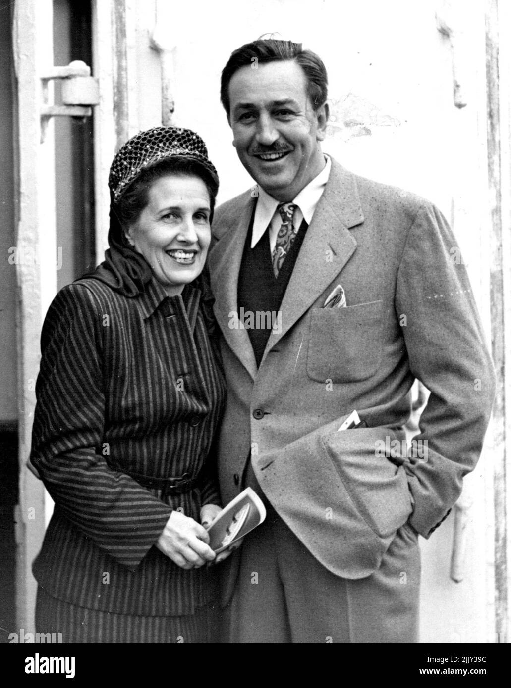 In Search Of Leprechauns - Mr. and Mrs Walt Disney (the world famous film cartoonist) arrived at Southampton this morning in the 'Queen Elizabeth'. They are to visit Ireland where Mr. Disney will study the habits of Leprechauns in their native haunts - his new film features the 'little people'. November 19, 1946. Stock Photo