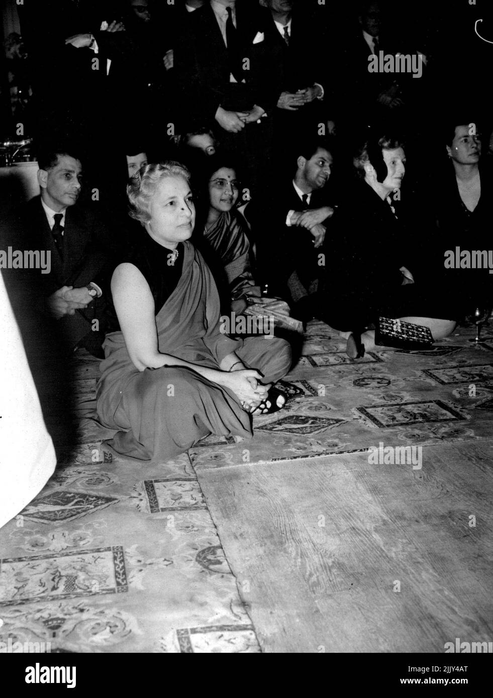 Hold Indian Party In London. Madame Pandit, India's High Commissioner to the U.K. London's Dorchester Hotel was the scene of an Indian Party Thursday. Highlight of the party was a warmly-applauded exhibition of dancing by Ram Gopal. The party was given by an Indian airline company. December 30, 1955. (Photo by London Express News And Features Services). Stock Photo