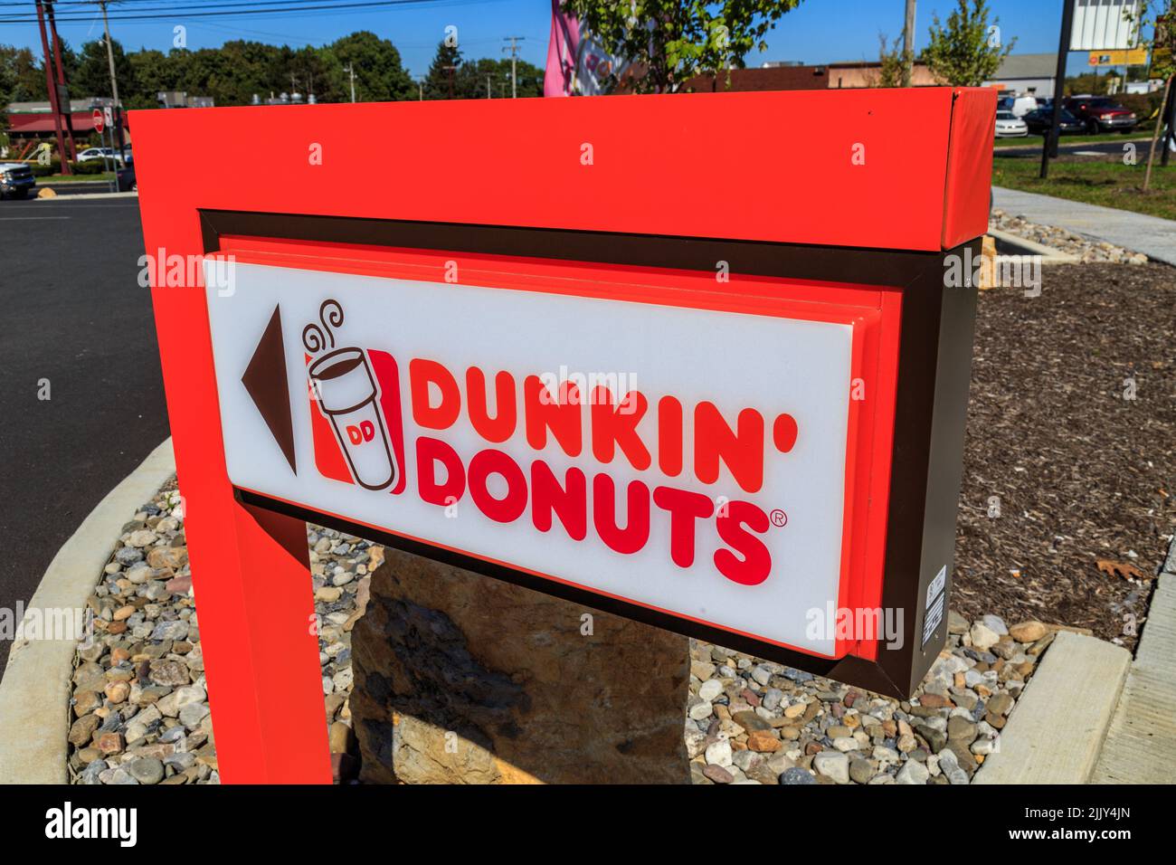 Ephrata, PA, USA – October 5, 2016: Exterior sign of Dunkin' Donut fast food bakery and store, which offers fresh doughnuts, sandwiches, coffee and be Stock Photo