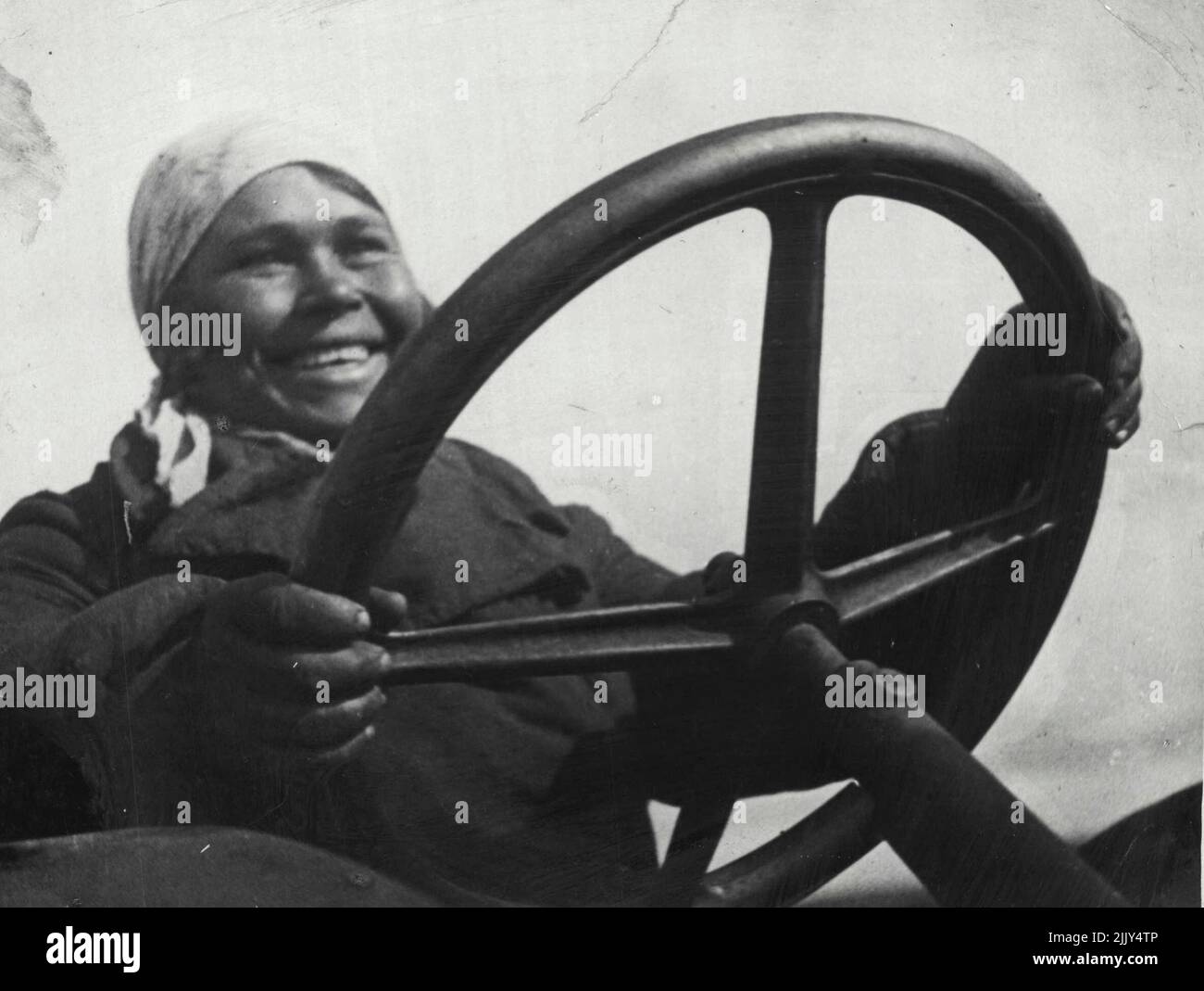 The Soviet woman takes men's professions. Makonine, the best tractor driver of the sovehoz ***** 4 (Khachasski District, Azerbaijad) (Guaranteed test). July 22, 1935. Stock Photo