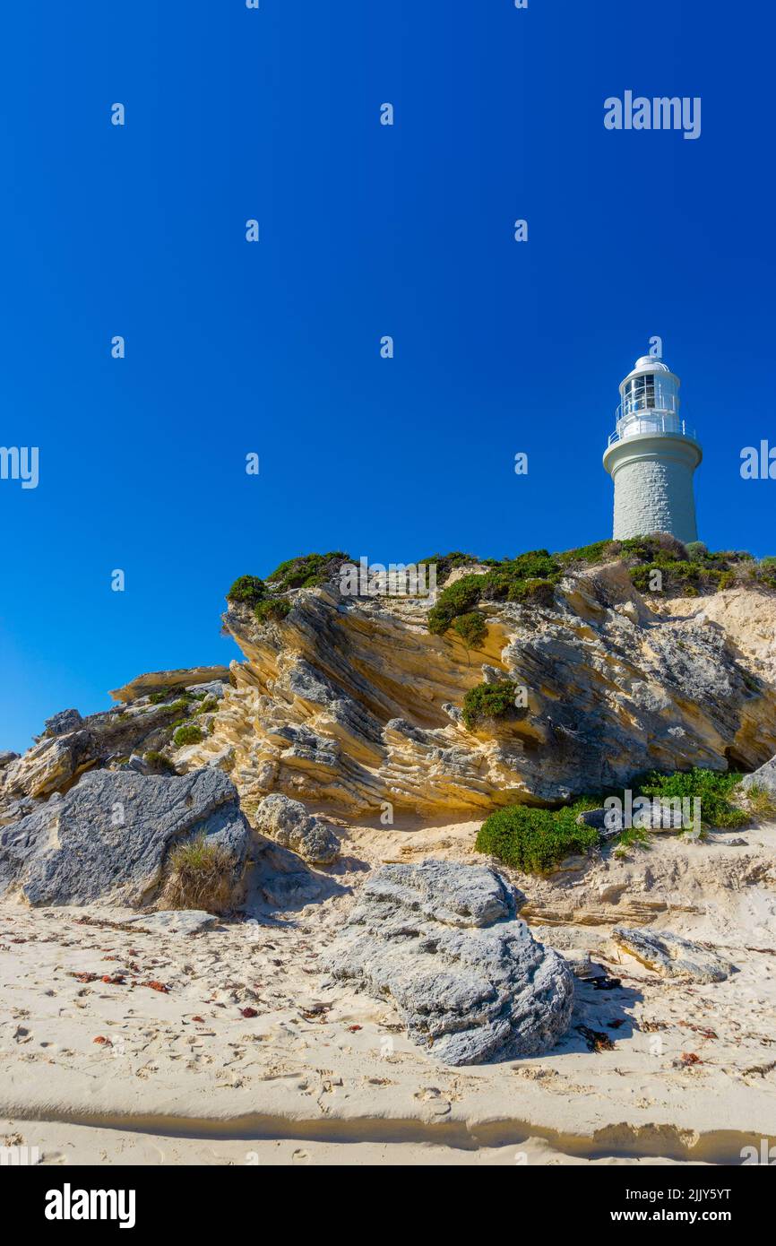 Bathurst Lighthouse on Rottnest Island just offshore from the city of Perth, in Western Australia. The historic lighthouse was built in 1900 due to a Stock Photo