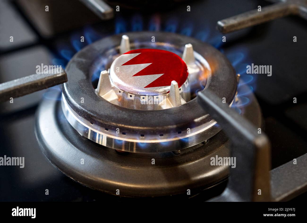Gas import and export concept. A burning gas burner of a home stove, in