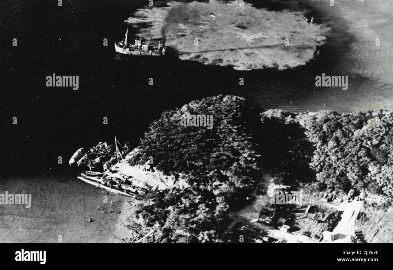 t submarine and torpedo boat base in a sheltered cave on Okinawa during preinvasion bombing of the island in the Ryukyu group. U.S. Navy planes pounded Okinawa for nine consecutive days before American forces landed on March 31, 1945. A day later the U.S. troops had cut the island in two, Okinawa, the largest Island in the Ryukyu (Loochoo) chain is north of Formosa and 362 miles (579 km.) south of the Japanese homeland. Capture of Okinawa will make possible a great intensification of air and sea assaults on Japanese home bases. April 27, 1945. (Photo by U.S. Office of War Information Picture). Stock Photo