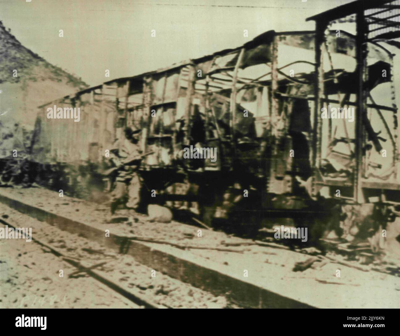 Old Exploded Train His rifle ready, a Yank soldier patrols through the wrecked railroad ...