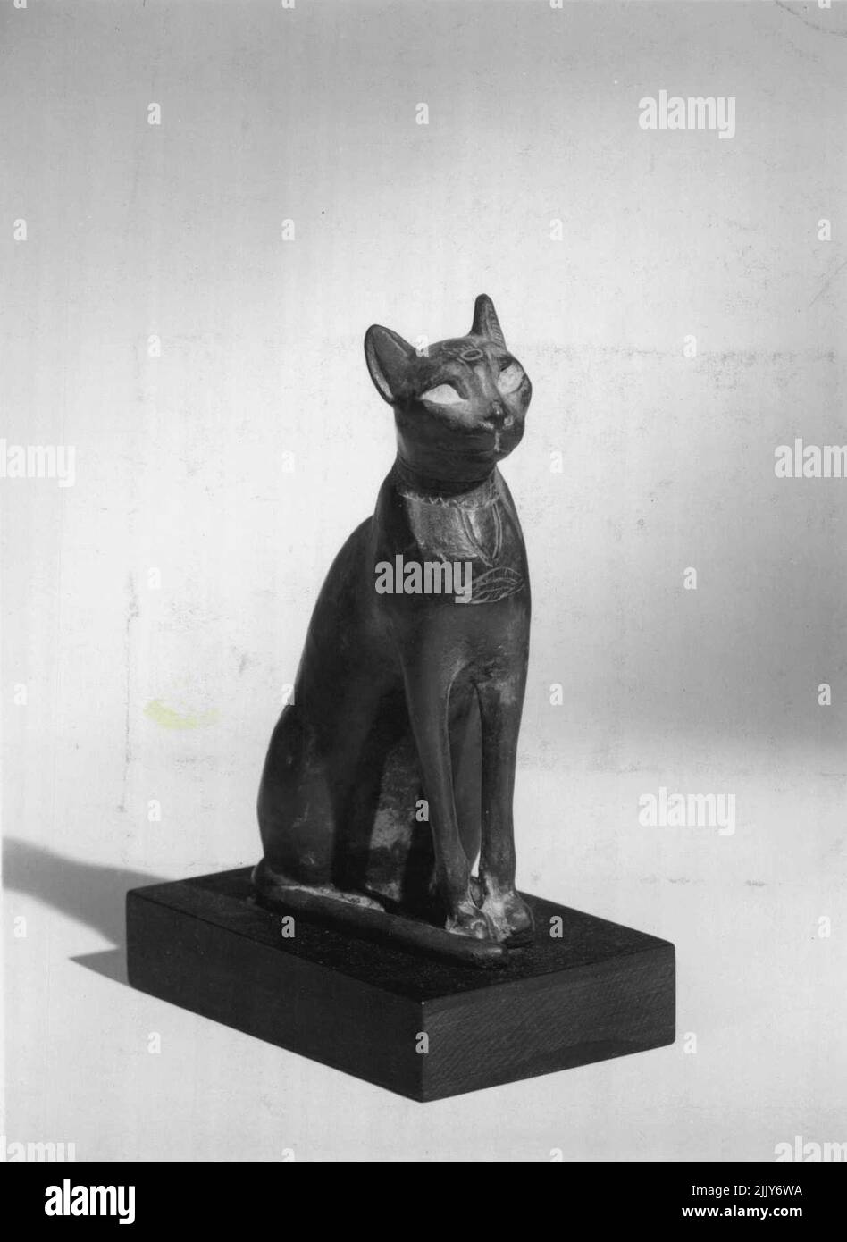 Cast -- Cat, scared to the goddess Bastet Bronze, Egyptian, late Dynastic Period, about 600-300 B.C. Height 7 inches Price $10,00, mailing charge 75 cents. June 1, 1952. (Photo by The Metropolitan Museum Of Art). Stock Photo