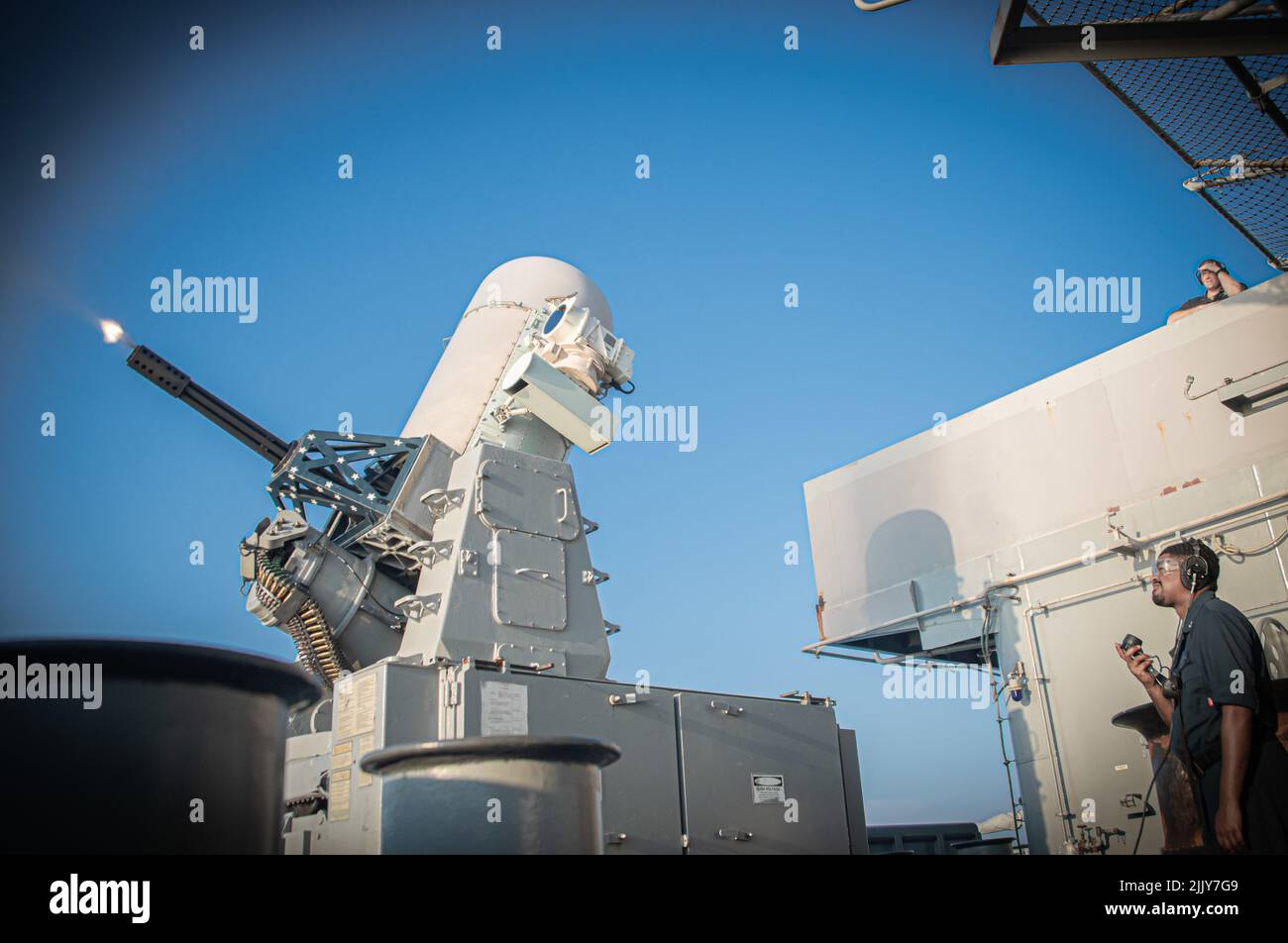 AT SEA (July 27, 2022) Fire Controlman 2nd Class Ellison Arnold, right ...