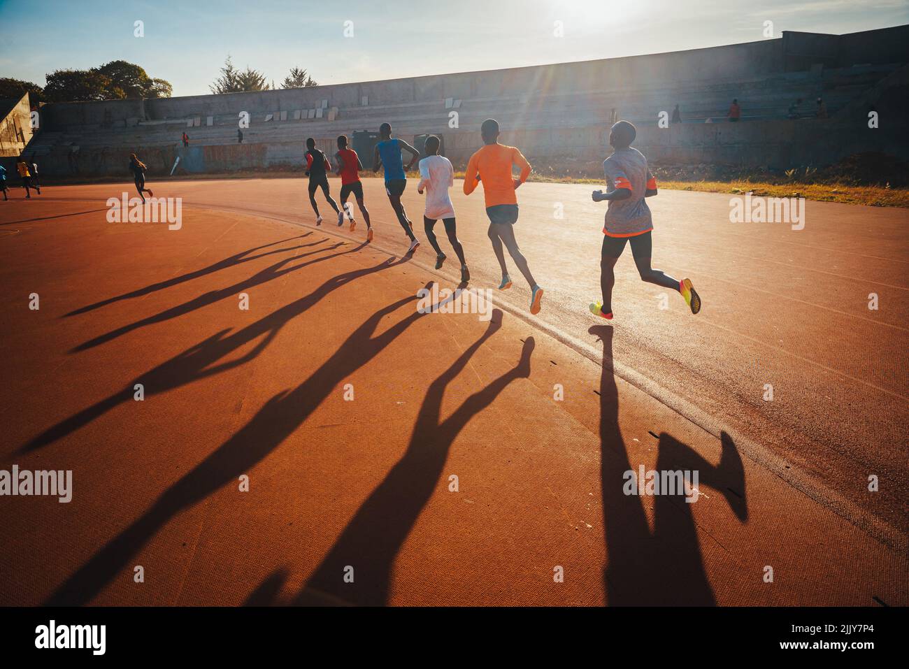 Kenyan marathon runners train at the athletics track in the town of