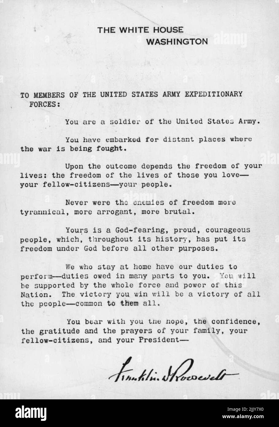 A Message From America's President To Its Boys Abroad. A copy of this letter from President Roosevelt is distributed to each member of the American Expeditionary Forces, as he leaves for service overseas. October 29, 1942. (Photo by Interfoto News Pictures, Inc.). Stock Photo