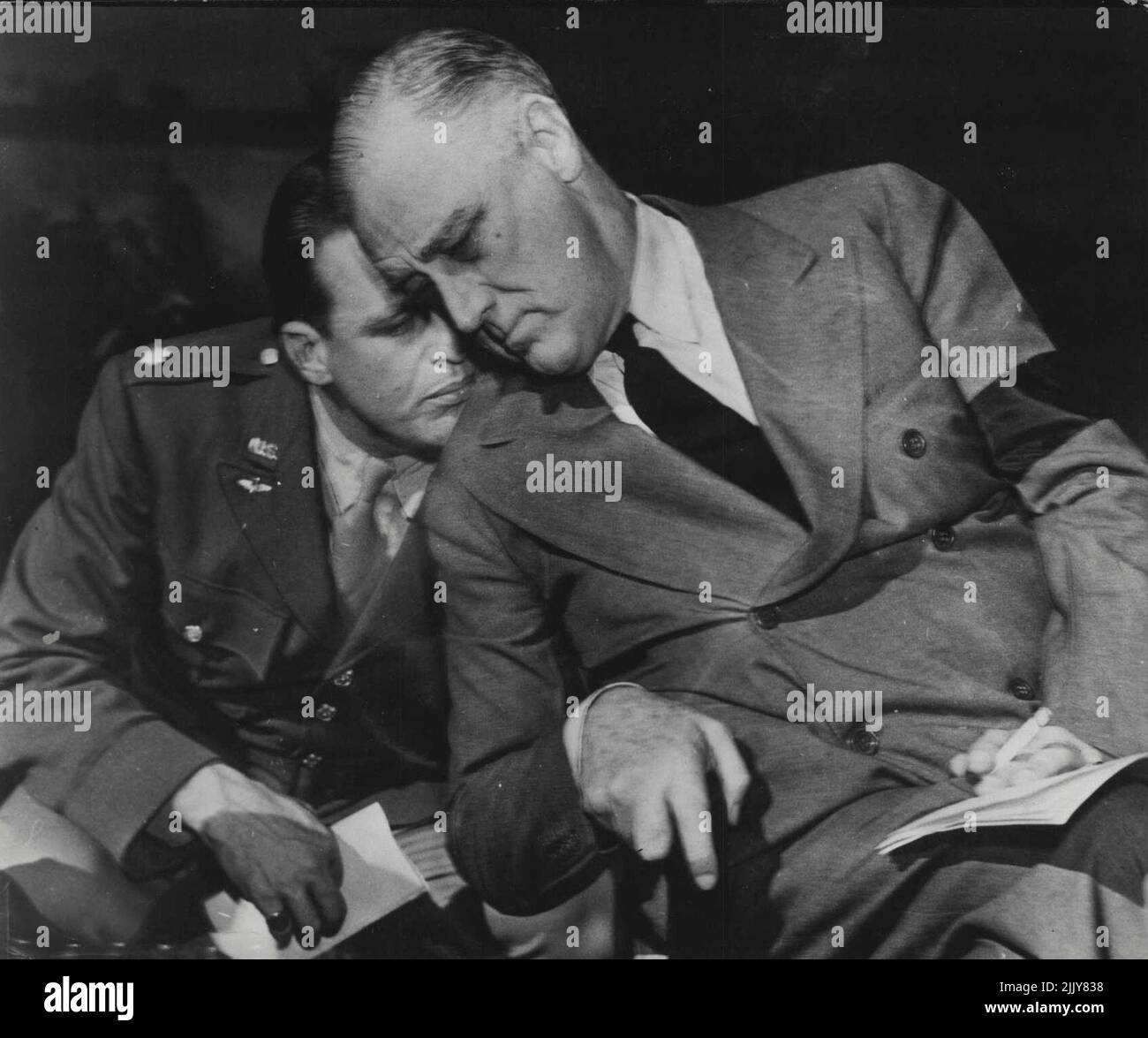 President Roosevelt Talks With His Son At Casablanca. President Franklin D. Roosevelt talks with his son, Lt. Col. Elliott Roosevelt, during the historic Allied conference at Casablanca. Lt, Col, Roosevelt is attached to a photographic unit of the U.S. Army Air Forces operating in North Africa. March 29, 1943. (Photo by Interphoto News Pictures, Inc.). Stock Photo
