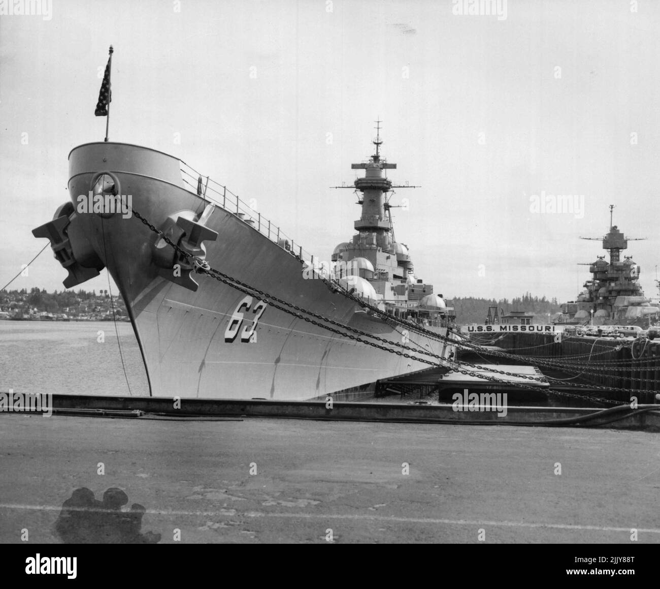 Anniversary In Mothballs (First Of Seven) -- The 'Mighty Mo,' the battleship USS Missouri, is tied up in Mothballs at the Puget Sound Naval Ship Yard at Bremerton Wash. Ten years ago, on September 02, 1945, the Japanese surrender was signed on its decks. July 29, 1955. (Photo by United Press). Stock Photo