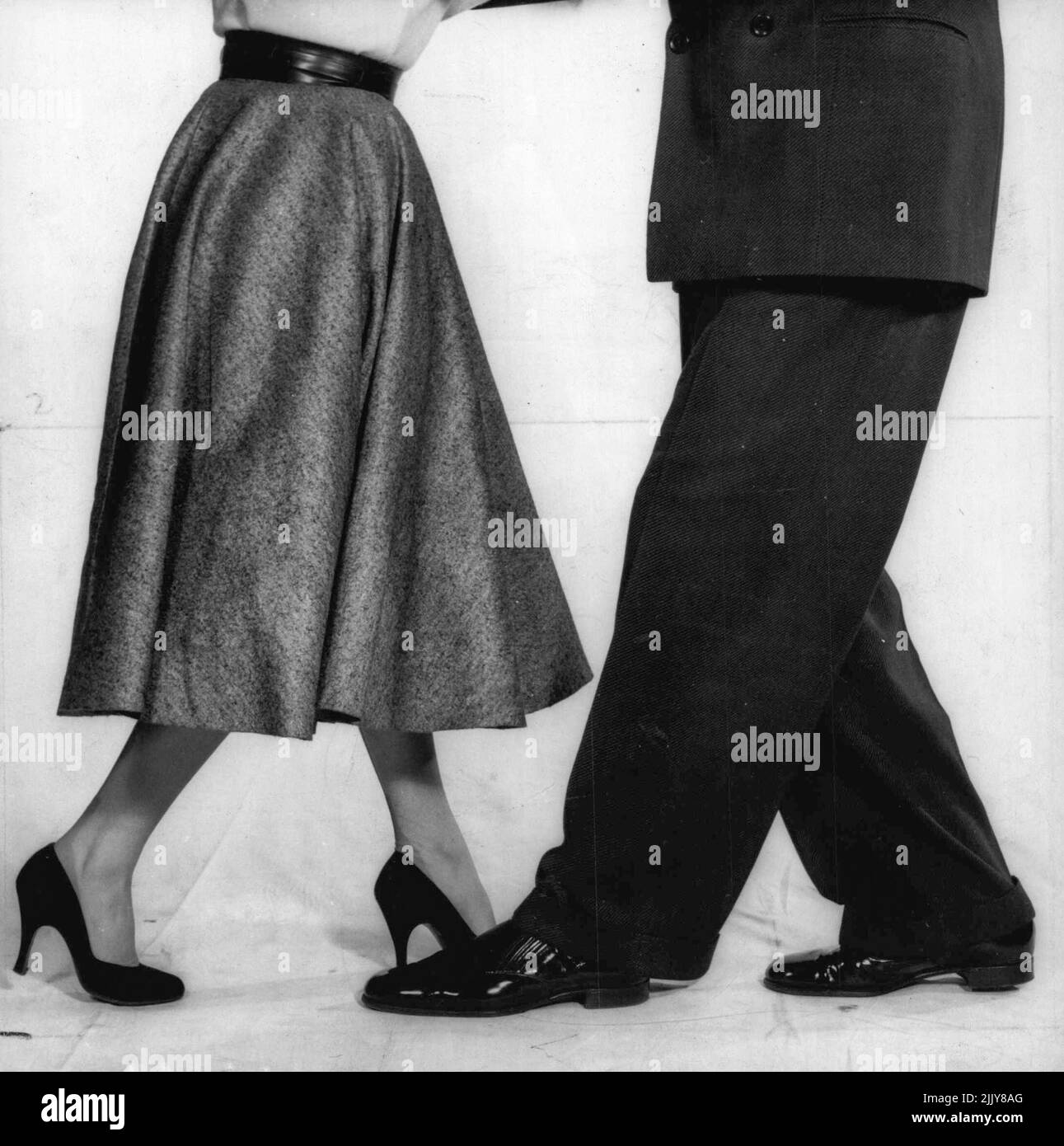 Step Two: Man takes a pace forward with left foot as girl steps back with her right. March 18, 1955. Stock Photo