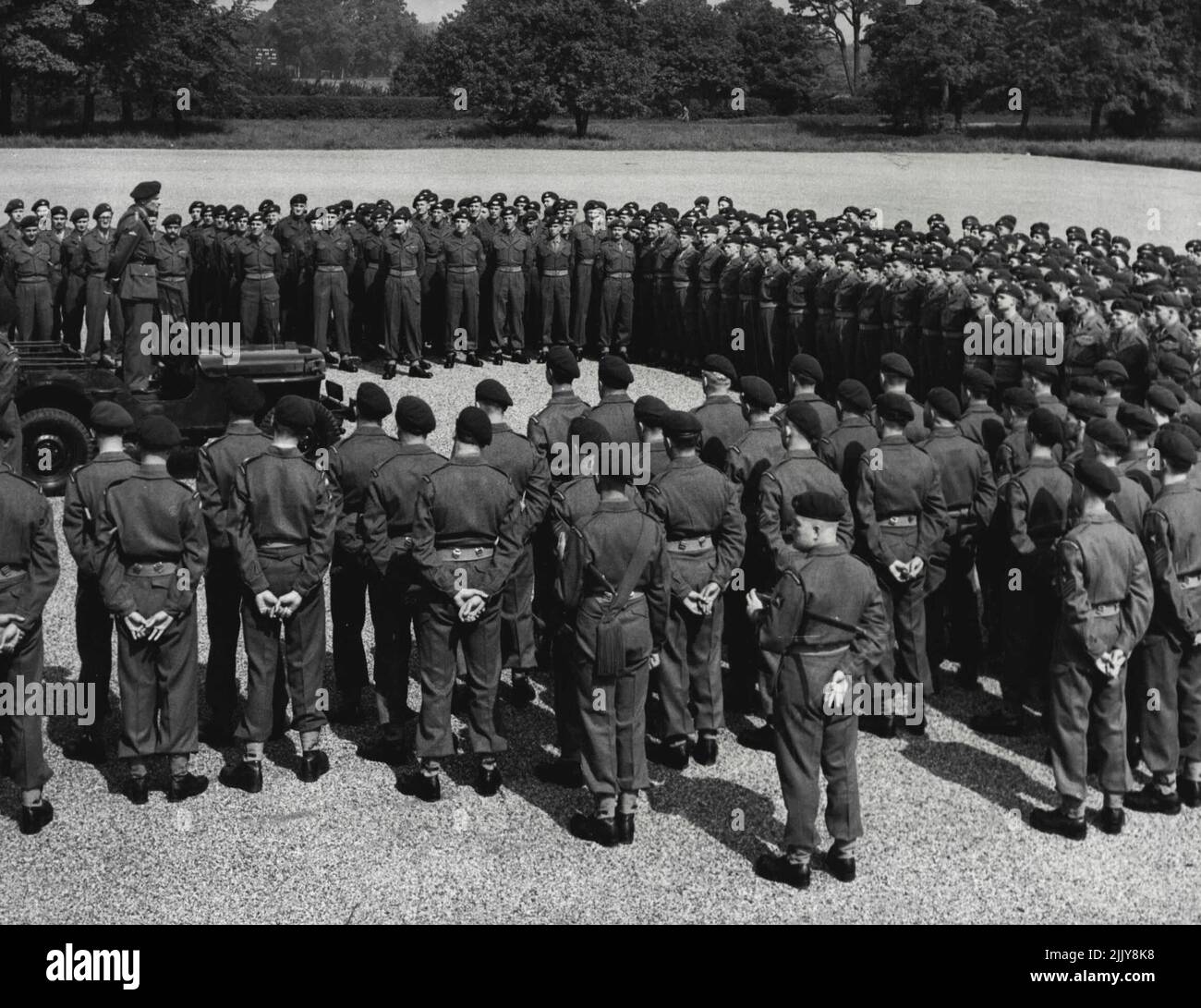 arachute regiment, is seen standing in a jeep on the parade ground at Albuhera Barracks, Aldershot, addressing officers and men of the 16th. Independent Parachute Bridge, June 3. Tomorrow, the brigade leaves for Cyprus. A small number of soldiers in the right place is better than a large number in the wrong place, he told them when referring to the east as a trouble spot. The field-marshal also informed the men that the king had approved of a Motto for the parachute regiment. The new Motto is 'Utrinque Paratus' which means 'Ready for anything'. July 12, 1951. (Photo by Associated Press Photo). Stock Photo