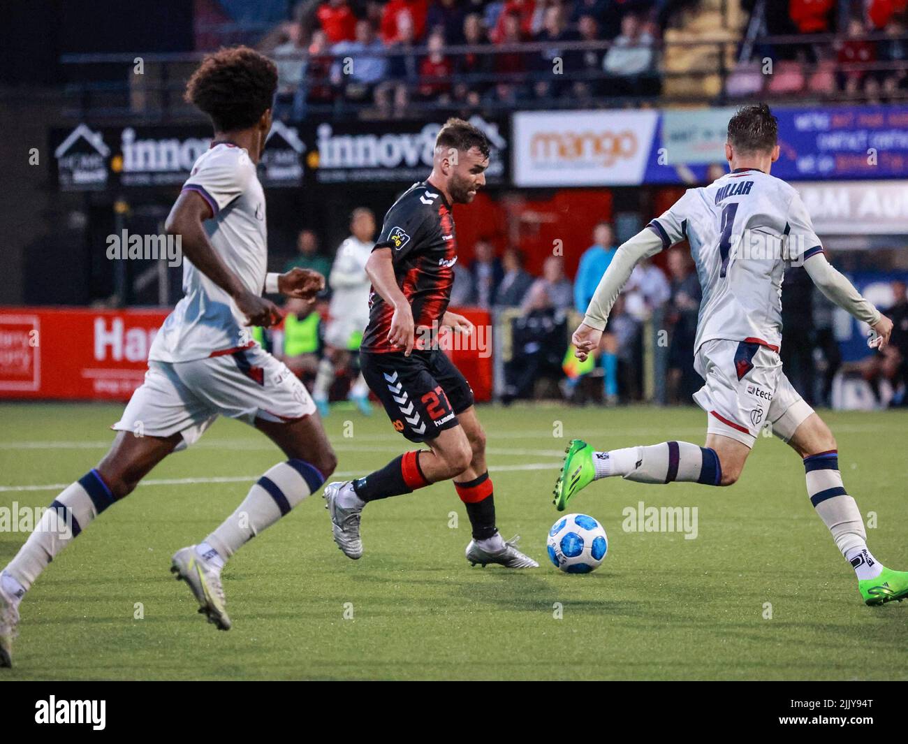 Seaview, Belfast, Northern Ireland, UK. 28 July 2022. UEFA Conference League Second Qualifying Round  (second leg) – Crusaders v Basel. Action from tonight's game at Seaview (Crusaders in red/black). Johnny McMurray on the attack for Crusaders. Credit: CAZIMB/Alamy Live News. Stock Photo