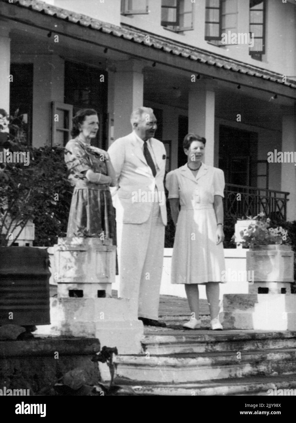 Lady Mountbatten In West Africa - The Countess Mountbatten of Burma, Superintendent-in-Chief of the St. John Ambulance Brigade, is on a visit to the West African colonies to find out what help her organisation can give to colonial medical work. Our picture shows Lady Mountbatten with Sir George Beresford Stooke, the Governor of Sierra Leone and Lady Beresford Stooke (right) at Governor's Lodge, Freetown. April 12, 1951. (Photo by Camera Press). Stock Photo