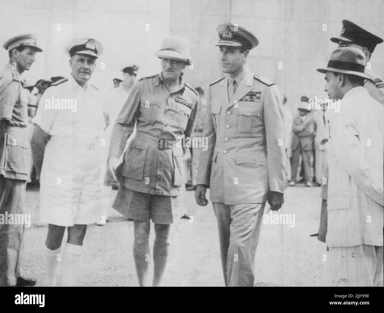 mand, with British Military and civil officials who were among the Allied Commanders who greeted him on his arrival in New Delhi, India, seat of his headquarters for the first time since assuming his new command. Left to right: Admiral Sir James Sommerville, Commander-in-Chief, Eastern Fleet; General Sir Claude Auchinleck, Commander-in-Chief, India; Lord Mountbatten; Mr. C.M. Trivedi, Secretary, War Department; and air Chief Marshal Sir Richard Peirse, air officer Commanding-in-Chief, The Air Force in India (Partially hidden by Mr. Trivedi). October 29, 1943. (Photo by Associated Press Photo). Stock Photo