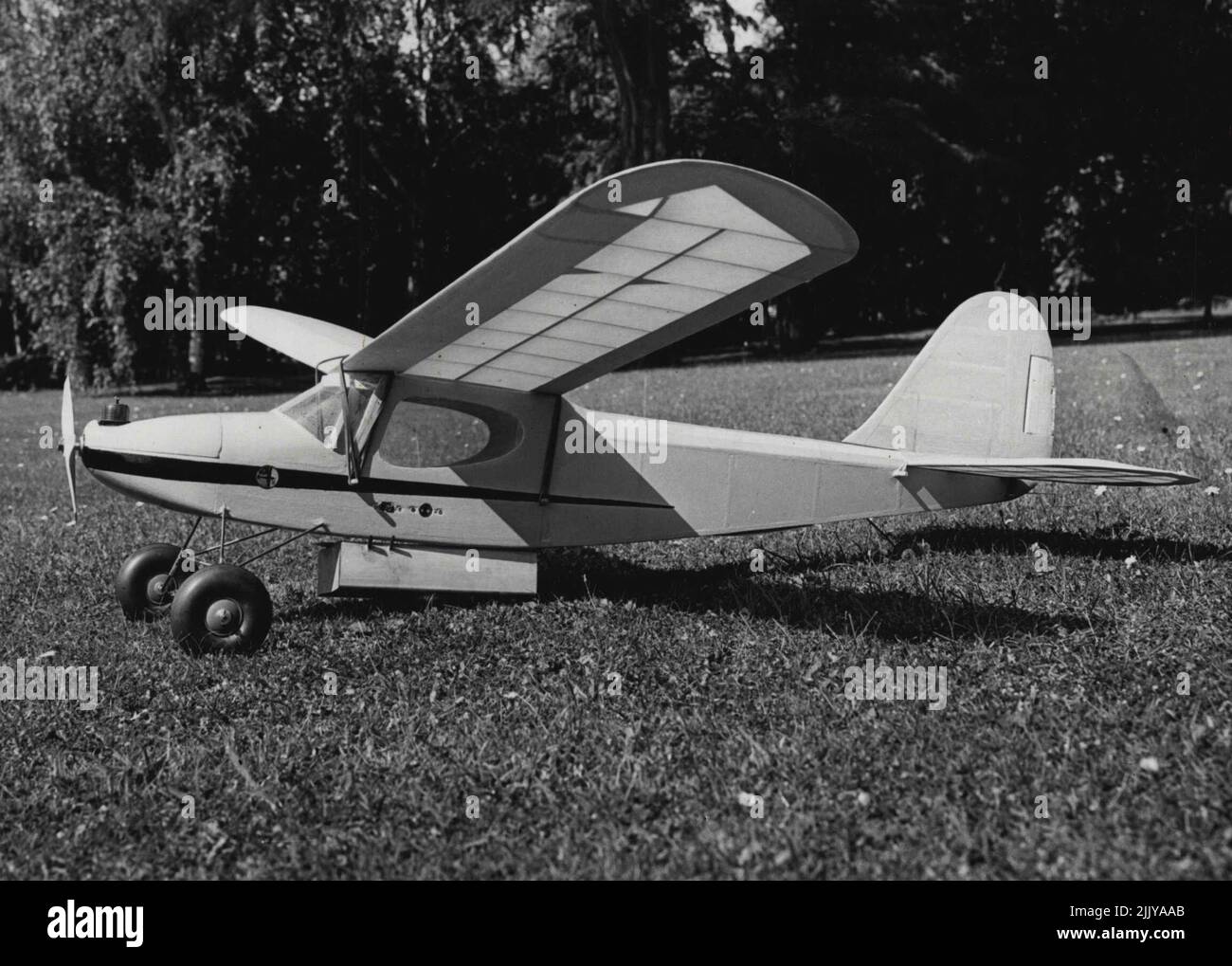 rth (Surrey) which is to make a cross-Channel flight attempt from Dover to Calais. Mr. John Ballard of Tolworth (Surrey) hopes to fly his model 'plane across the channel in the near future. This attempt - the object of which is to boost export orders in the British Model Engineering Industry - will be the first ever made. The plane which has a wing span of 5' 9' and a six-ounce diesel engine, will be controlled in flight by radio. The fuselage will be packed with Ping-pong balls and the crossing, from Dover to Calais, is expected to take about an hour. September 6, 1954. (Photo by Fox Photos). Stock Photo