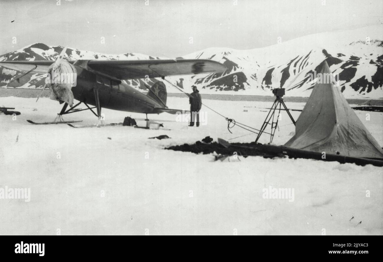 First Photos Walkins-Hearst Expedition Into The Antarctic -- The speedy Lockheed-Vega plane in which Capt. Sir Hubert Wilkins and Lt. Carl Ben Eielson Flew over the Antarctic was set up on skills before taking-off on the air expedition. June 5, 1929. Stock Photo