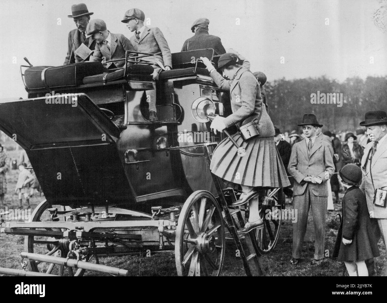 The Princess Royal at the Bramham Moor point to point meeting at Swindon Wood, near Harrogate. The Princess Royal joins her family on the Judges coach. L to R :- Lord Harewood, Lord Lascelles and the Hon. Gerald Lascelles. May 22, 1933. (Photo by Sport & General Press Agency, Limited). Stock Photo