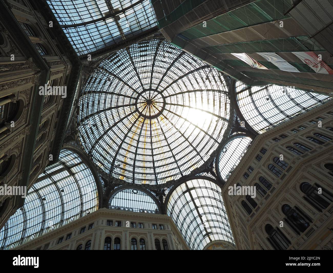 The huge glass dome of the grand Galleria Umberto 1 shopping mall from the inside, Naples city center, Campania, Italy Stock Photo