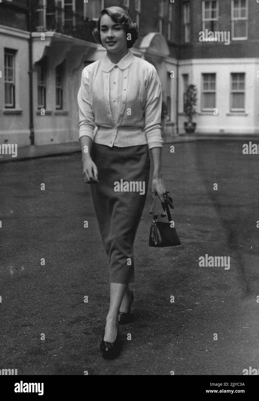 The girl who will marry Lord Dalkeith to Day's picture Strolling in London today was 22 years-old Miss Jane McNeill, who as engagement to the Earl of Dalkeith friend of Princess Margaret, is announced to-day. Miss McNeill is the daughter of Mr John McNeill, Q.C., and Mrs McNeill, of Appir. Argyll. The couple have known each other for about four years. Lord Dalkeith, 28, is the only son and heir of the Duke and Duchess of Buccleuch. August 6, 1952. Stock Photo