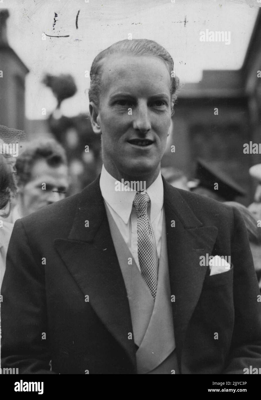 Photo Shows:- Lord Dalkeith, whose name has ***** romantically linked with Princess Margaret ***** Photographed when he attended the wedding ***** Peter's. The King and Queen, with Princess Margaret, were guests at the wedding of Lady Caroline Thynne, 21 - year - old daughter of the Marquess and Marchioness of Bath, and Mr.David Somerset, at St.Peter's, Eaton-Square, to-day. Mr.Somerset is hair-presumptive to the Duke of Beaufort. For the Ceremony the bride wore a white and silver brocade gown patterned with roses. July 05, 1950. Stock Photo