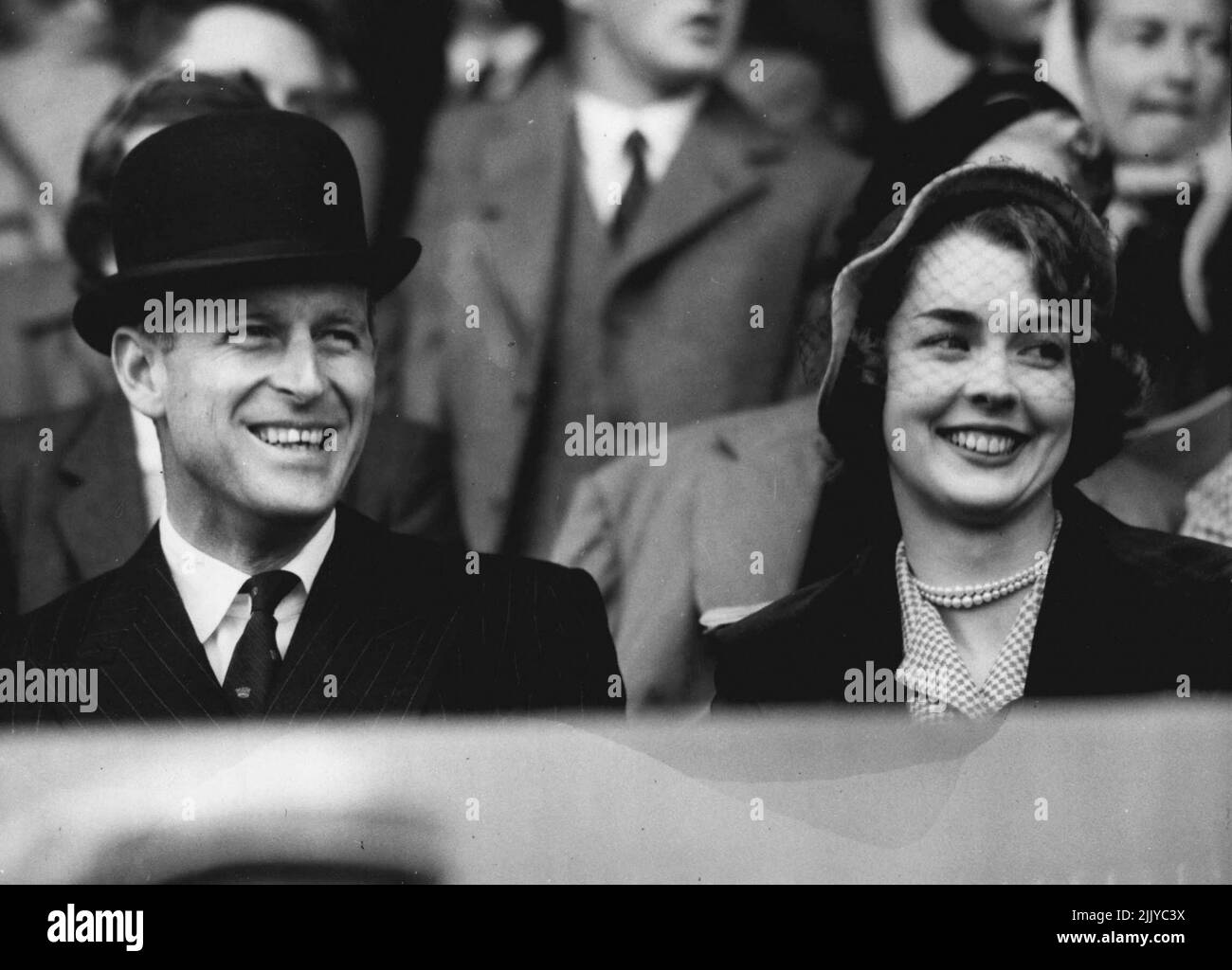 The Edinburgh Festival Opens Photo Shows:- The Duke of Edinburgh with Miss Jane McNeill in the Grandstand at Edinburgh yesterday. Miss McNeill's Engagement to the Earl of Dalkeith was announced recently. August 18, 1952. (Photo by Paul Popper) Stock Photo