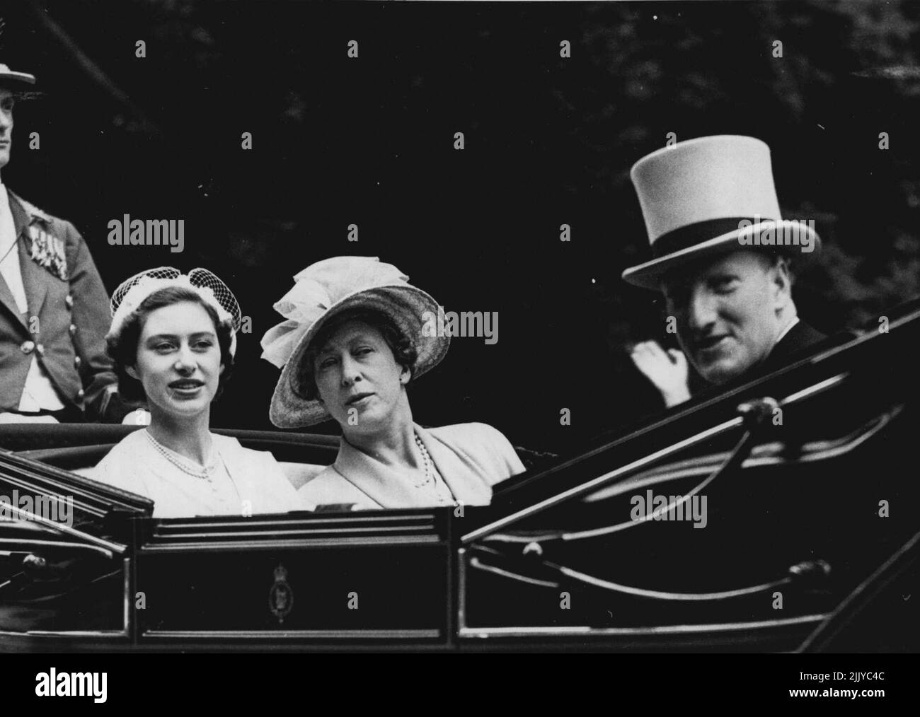 Photo Shows:- The Earl of Dalkeith rides in Princess Margaret's carriage an route from Windsor Great Park to Royal ***** (June 13th 1950) with them is the Princess Royal. The Earl of Dalkeith Royal Engagement Report:- In a report from London, the Paris newspaper 'France Soir' says that Princess Margaret's engagement to the Earl of Dalkeith will be announced in August. The Earl who is heir to the Duke of Buccleuch is 26, He served in the Royal Nave throught out the war. June 01, 1950. (Photo by Fox Photos). Stock Photo