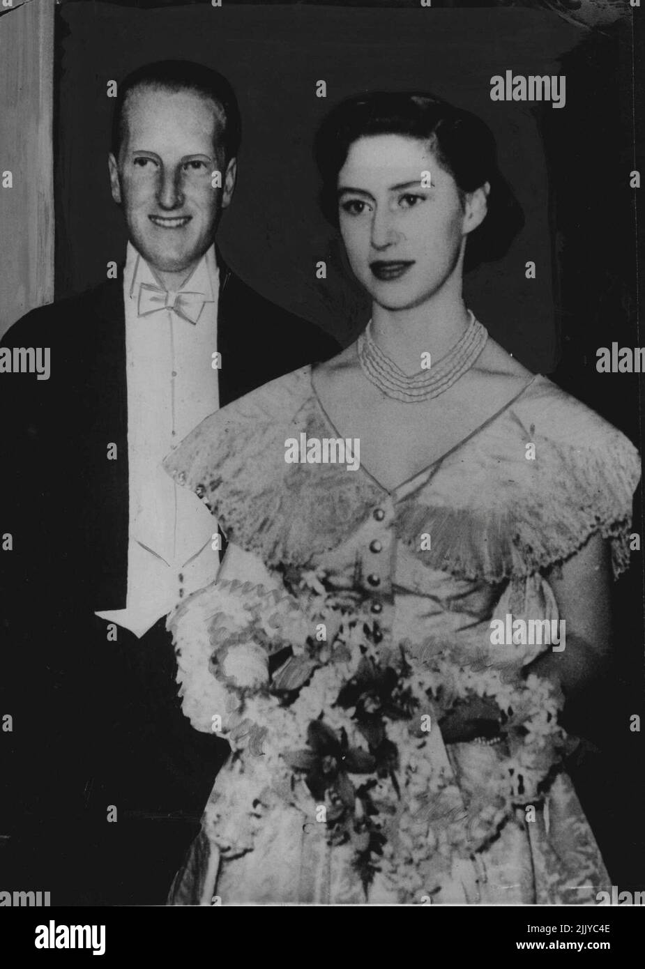 Princess Margaret with the Earl of Dalkeith, whose surprise journey to join the Royal party at Sandringham has Strengthened Rumours that the Princess engagement will soon bee announced. The Princess returned to Sandringham on Saturday. ***** of schedule, from Scotland where she had been holidaying at the home of the Duke and Duchess of Buccleuch, Parents of the Earl. During her stay, they attended hunt ***** and a hunt meet together. January 14, 1952. Stock Photo