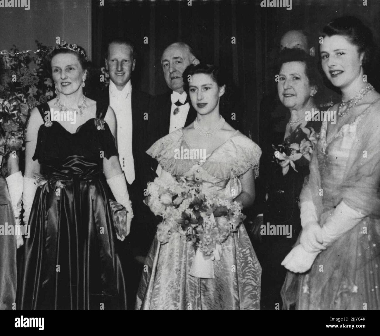 the Ball held in Glasgow in aid of the Scottish Association of Girls Clubs. Left to Right: Miss Sheila Carlon, the Duchess of Buccleuch, the Earl of Dalkeith. 25 - year - old only son of the Duke of Buccleuch, Sir Hector McNeill , Lord Provost of Glasgow, Princess Margaret, Lady McNeill, and Lady Caroline Scott 21 - year old younger daughter of the Duke and Duchess of Buccleuch, one of Princess Margaret's great friends. Week-End in Scotland Princess Margaret is Week-Ending in Scotland. She is staying with the Duke and Duchess of Buccleuch at Drumlanrig Castle, Dumfriesshire. February 20, 1949. Stock Photo