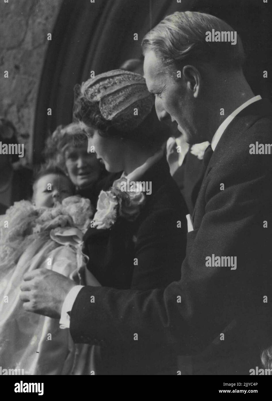 The Earl and Countess of Dalkeith pictures with their baby Son, Lord Eskdaill, heir to the title, after the baby's christening Yesterday at holy Trinity Church, Melrose, Roxburghshire. He was given the names Richard Walter John. Lady Dalkeith acted as proxy for Princess Margaret, who is one of the godmothers. April 08, 1954. (Photo by Daily Mirror). Stock Photo