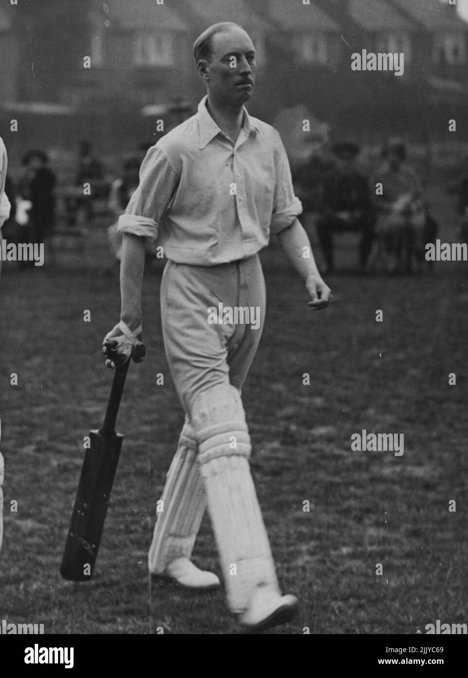 The new Duke of Buccleuch, who inherited the title on his father's death recently, snapped going out to bat at a recent county game. He is the Brother-in-law of the Duke of Gloucester. December 02, 1935. Stock Photo