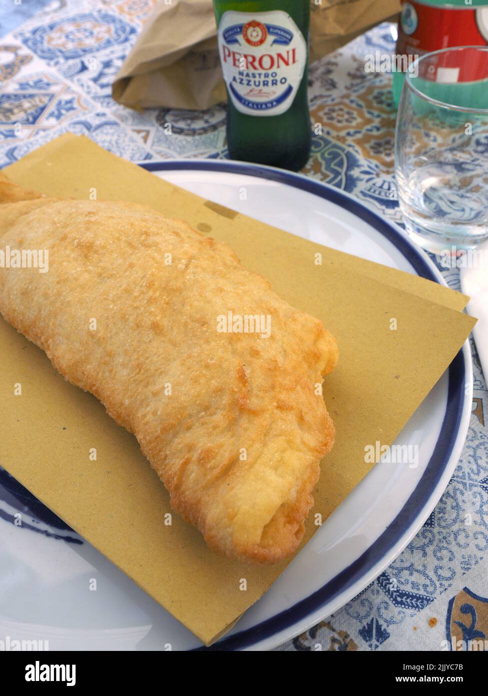 Pizza Fritta, or deep-fried pizza, is a famous Neapolitan food specialty. Naples, Campania, Italy Stock Photo