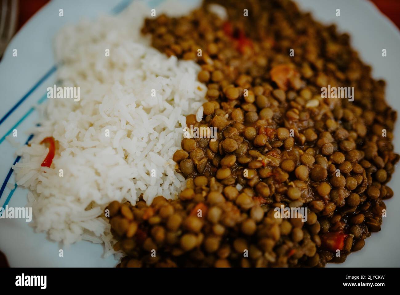 Lentils and rice, a typical African dish in Kenya. A source of carbohydrates and vitamins. Healthy African food Stock Photo
