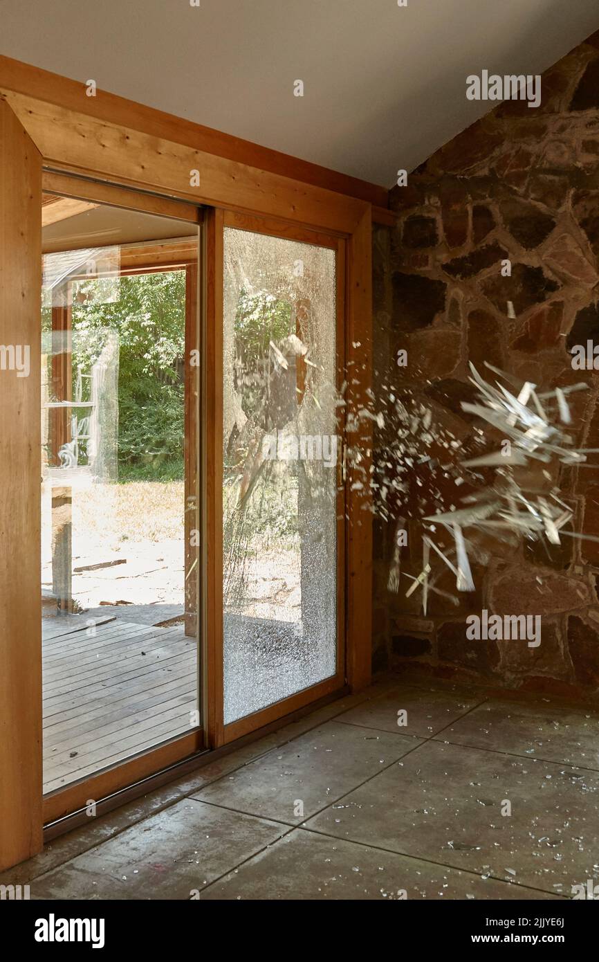 Rock being thrown through sliding glass door, Home Invasion, Smashed