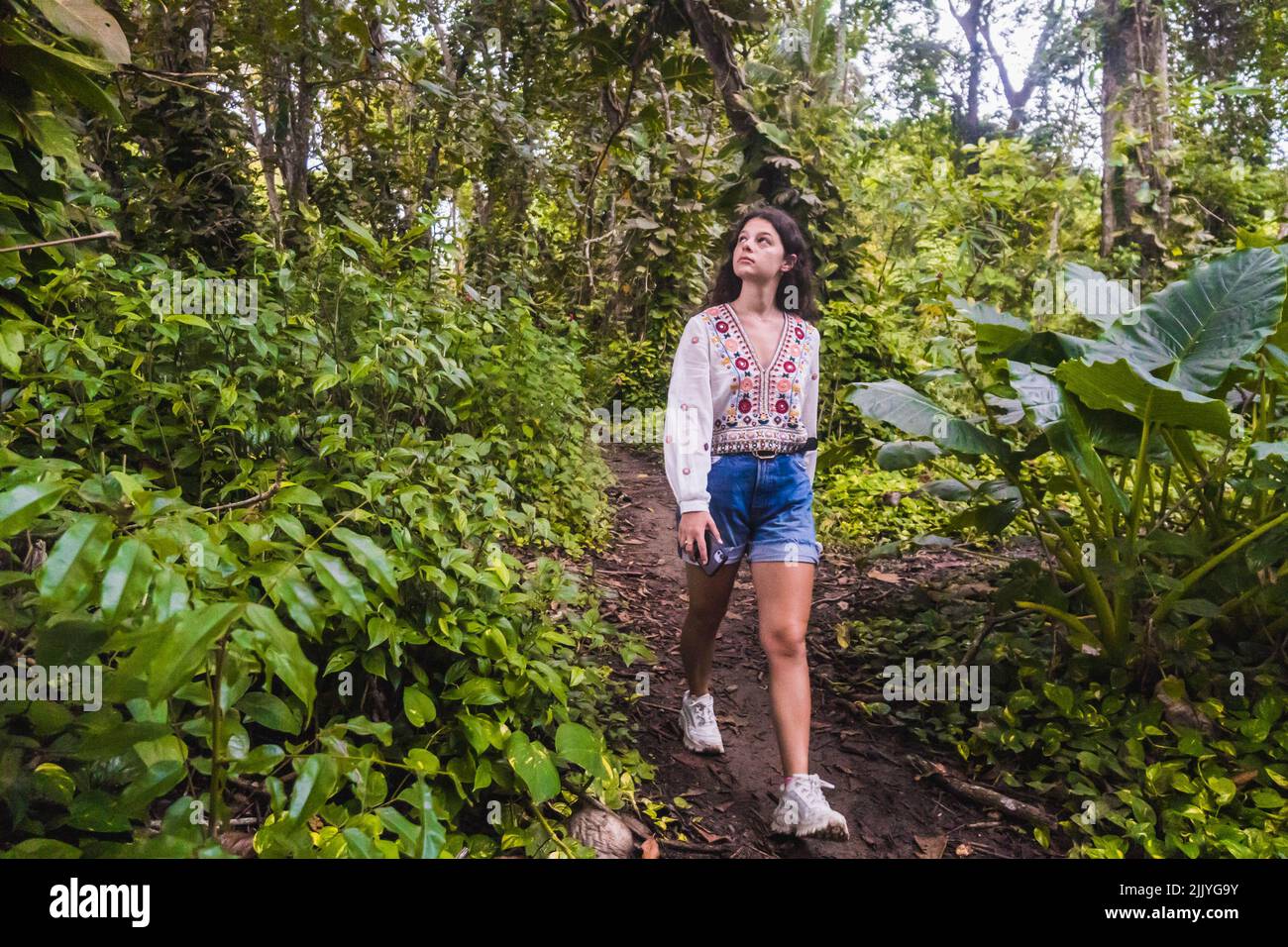 woman in the jungle of Costa Rica Stock Photo