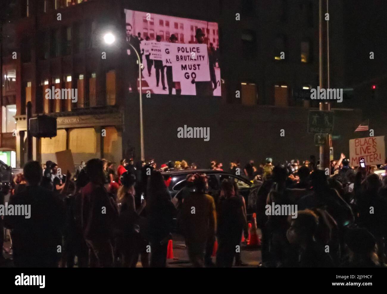 Projection art is used at a black lives matter protest in Portland, Oregon Stock Photo