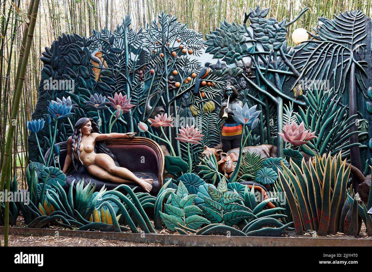 Erotica Tropicallis; large sculpture, nude woman on sofa, jungle scene, bamboo beyond, by Seward Johnson; Grounds for Sculpture; Seward Johnson Center Stock Photo