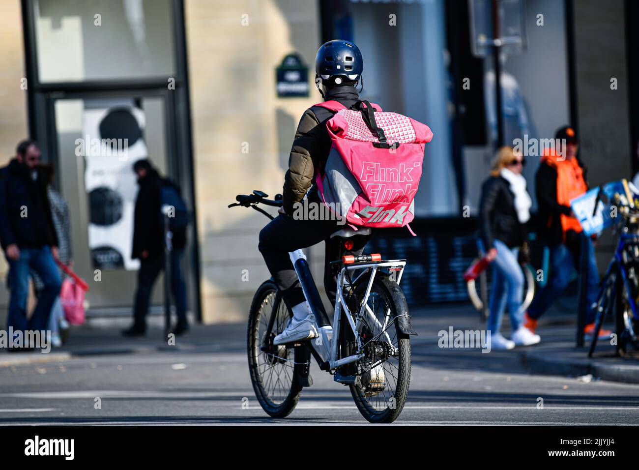 Flink Rider A deliver for Flink on his bike (bicyle). Illustration of delivers for ...