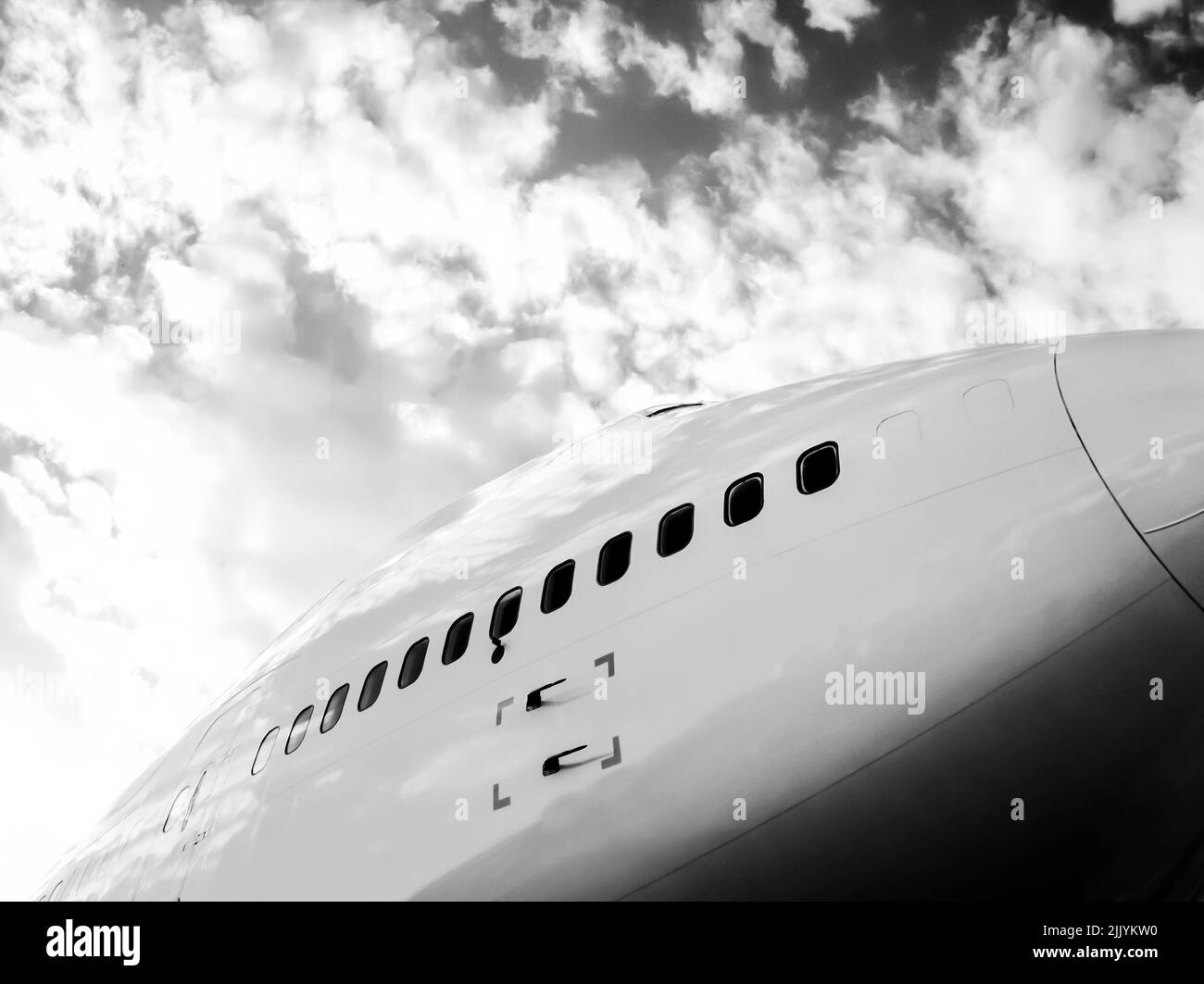 Close up of fuselage and cockpit of an aeroplane - B&W Stock Photo
