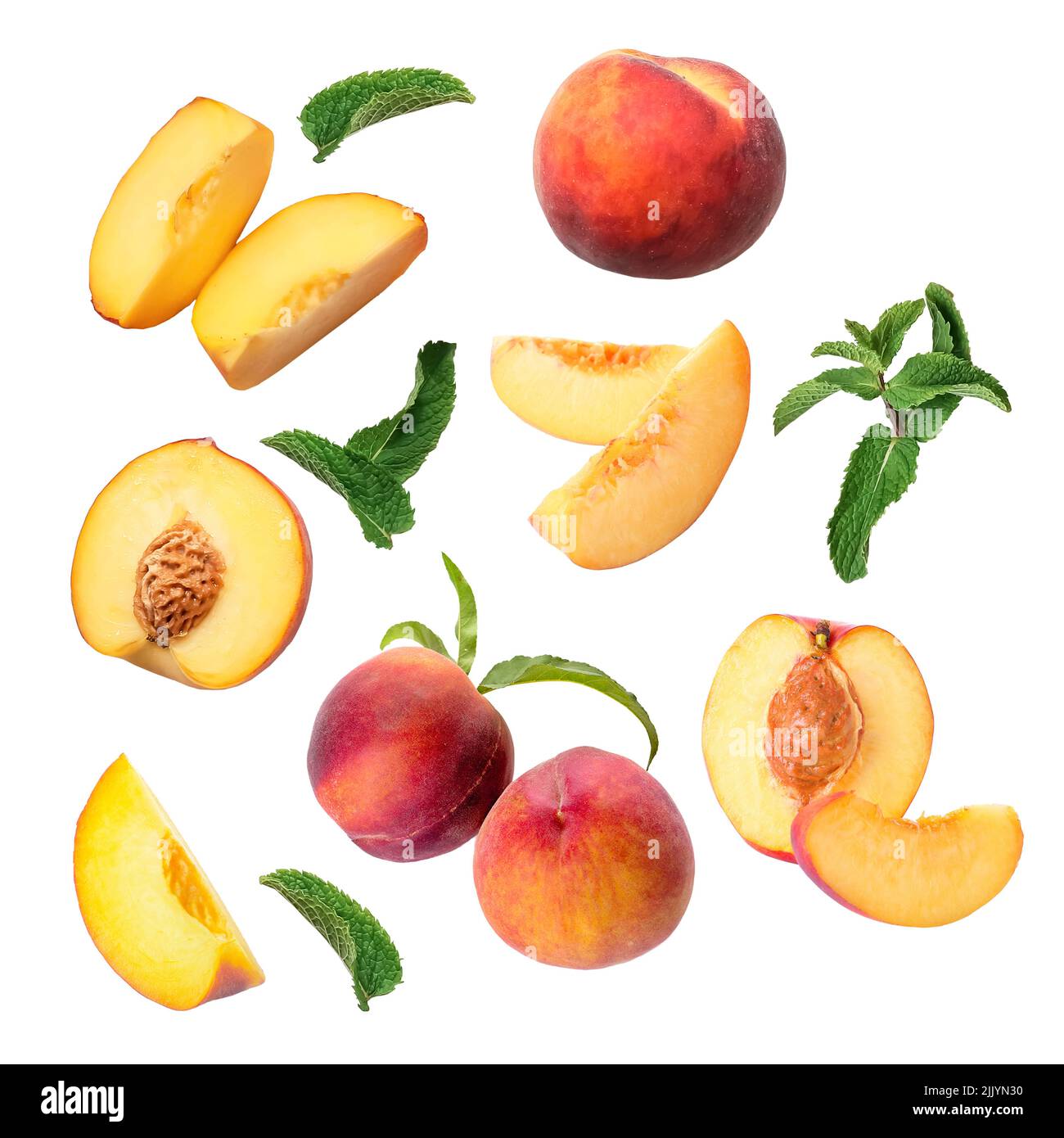 Flying ripe peaches on white background Stock Photo - Alamy