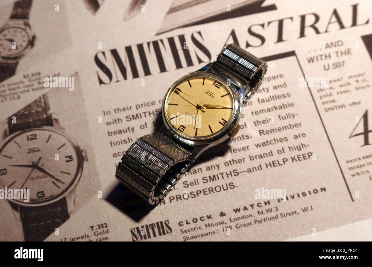 1960's Smiths Astral watch on an original Smiths Watches Cheltenham advert Stock Photo