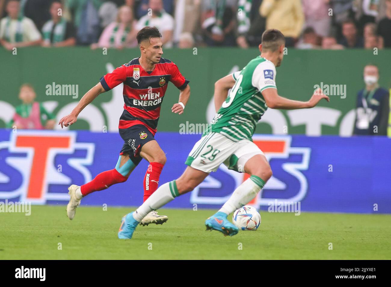 Gdansk, Poland. 28th July, 2022. Nicolas Kuhn (L) of Rapid Vienna and David Stec (R) of Lechia Gdansk are seen in action during the UEFA Europa Conference League match between Lecha Gdansk and SK Rapid Vienna in Gdansk. (Final score; Lechia Gdansk 1:2 SK Rapid Vienna) (Photo by Tomasz Zasinski/SOPA Images/Sipa USA) Credit: Sipa USA/Alamy Live News Stock Photo