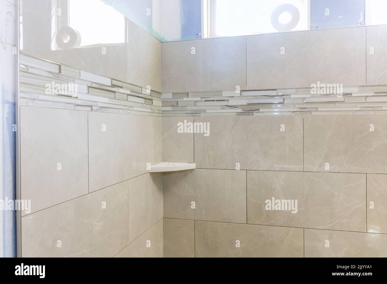 Designer renovation construction bathroom with bath tub shower Stock