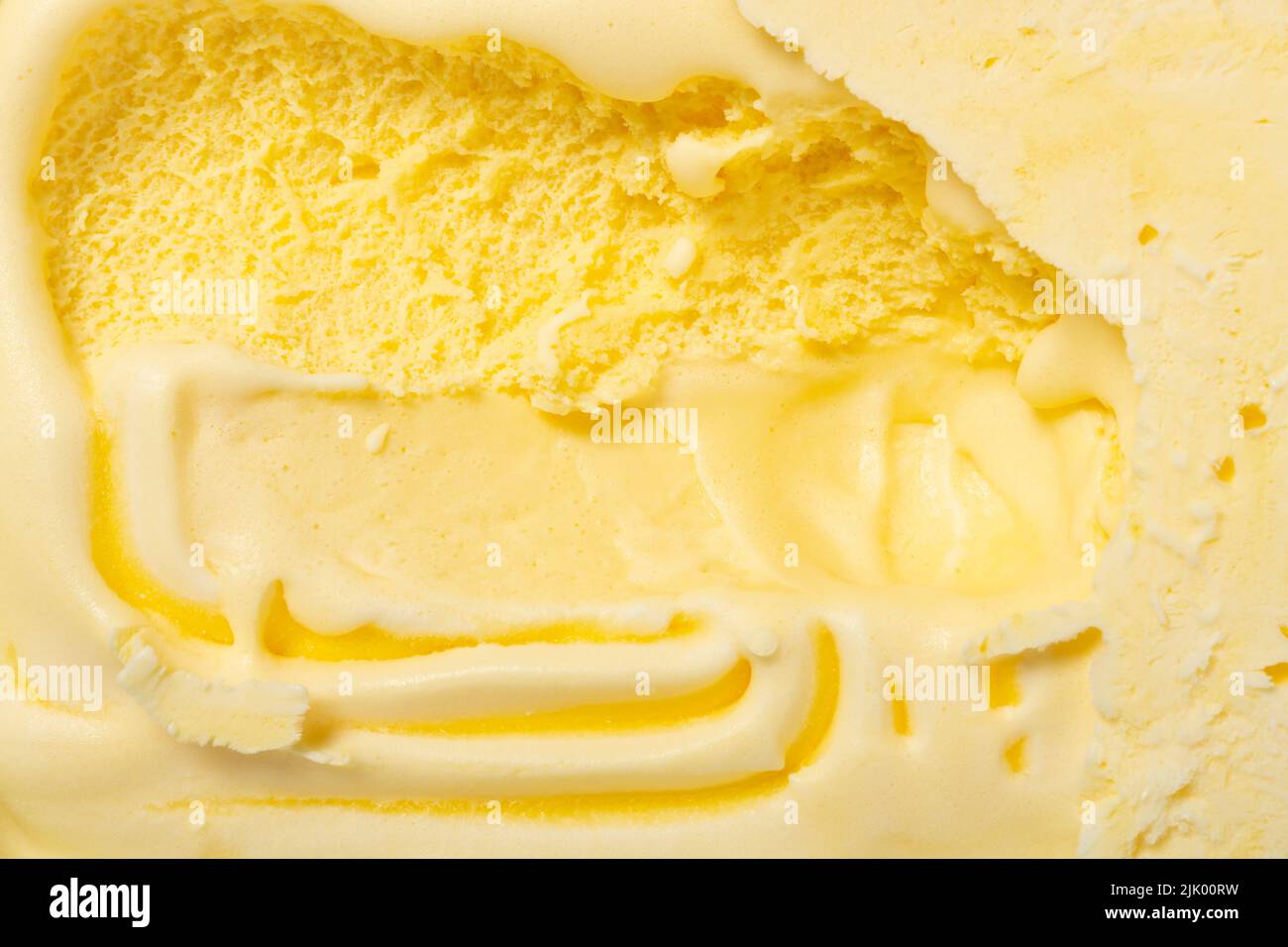 top view pineapple flavor ice cream had been scooped as background and texture at horizontal composition Stock Photo
