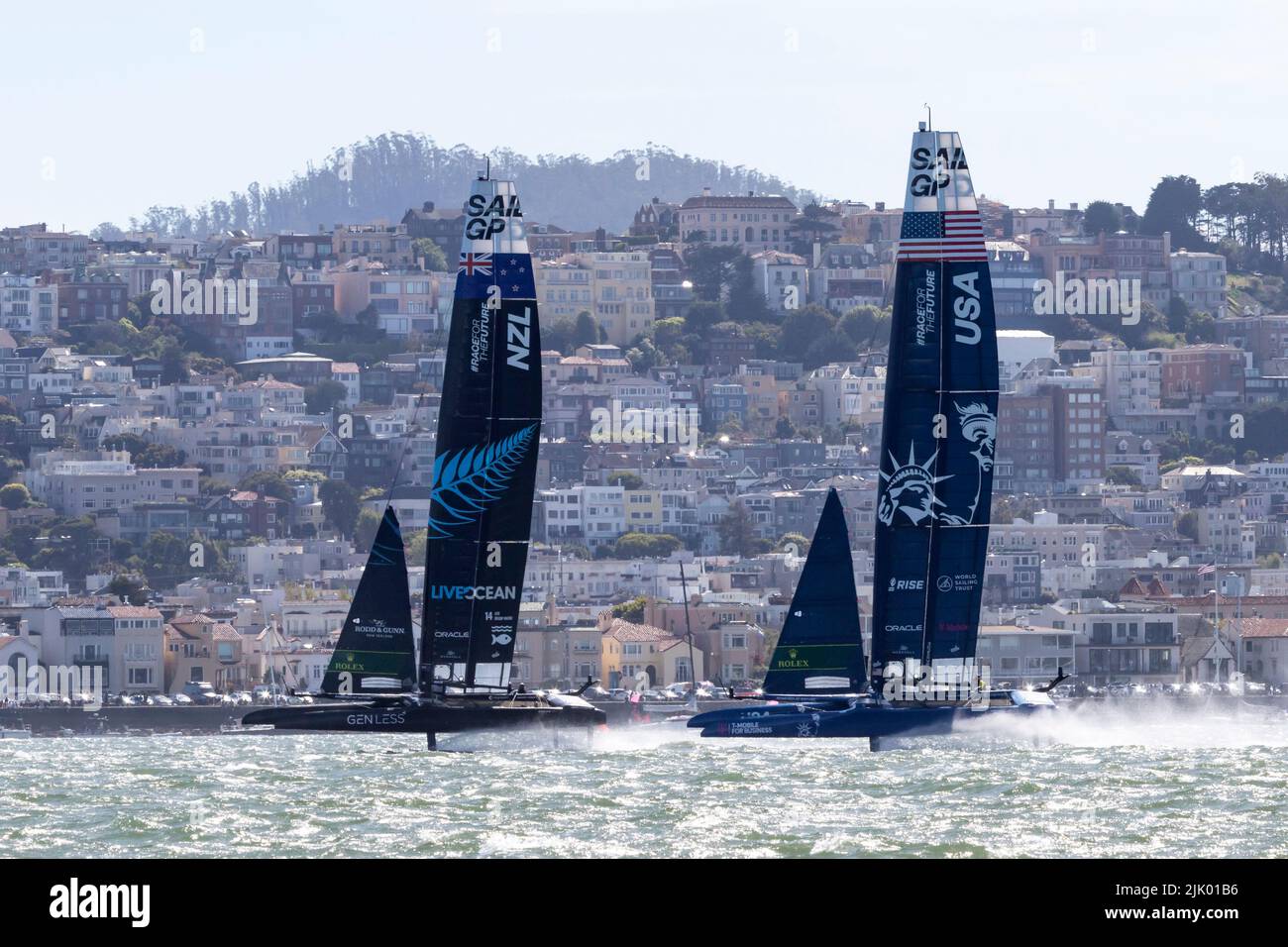 F50 catamaran of New Zealand and the United States race on the waters of San Francisco Bay during the 2022 SailGP races. Stock Photo