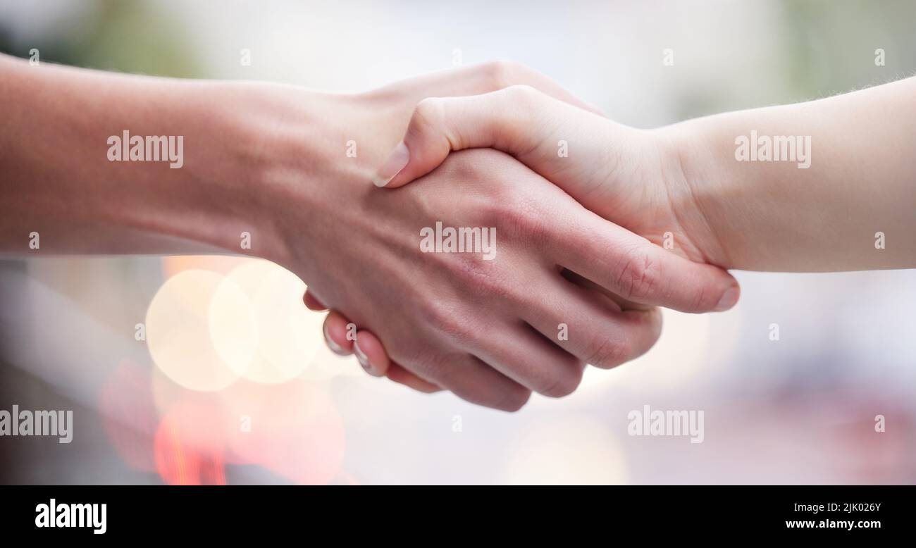 Its a done deal. two unrecognizable businesspeople shaking hands. Stock Photo