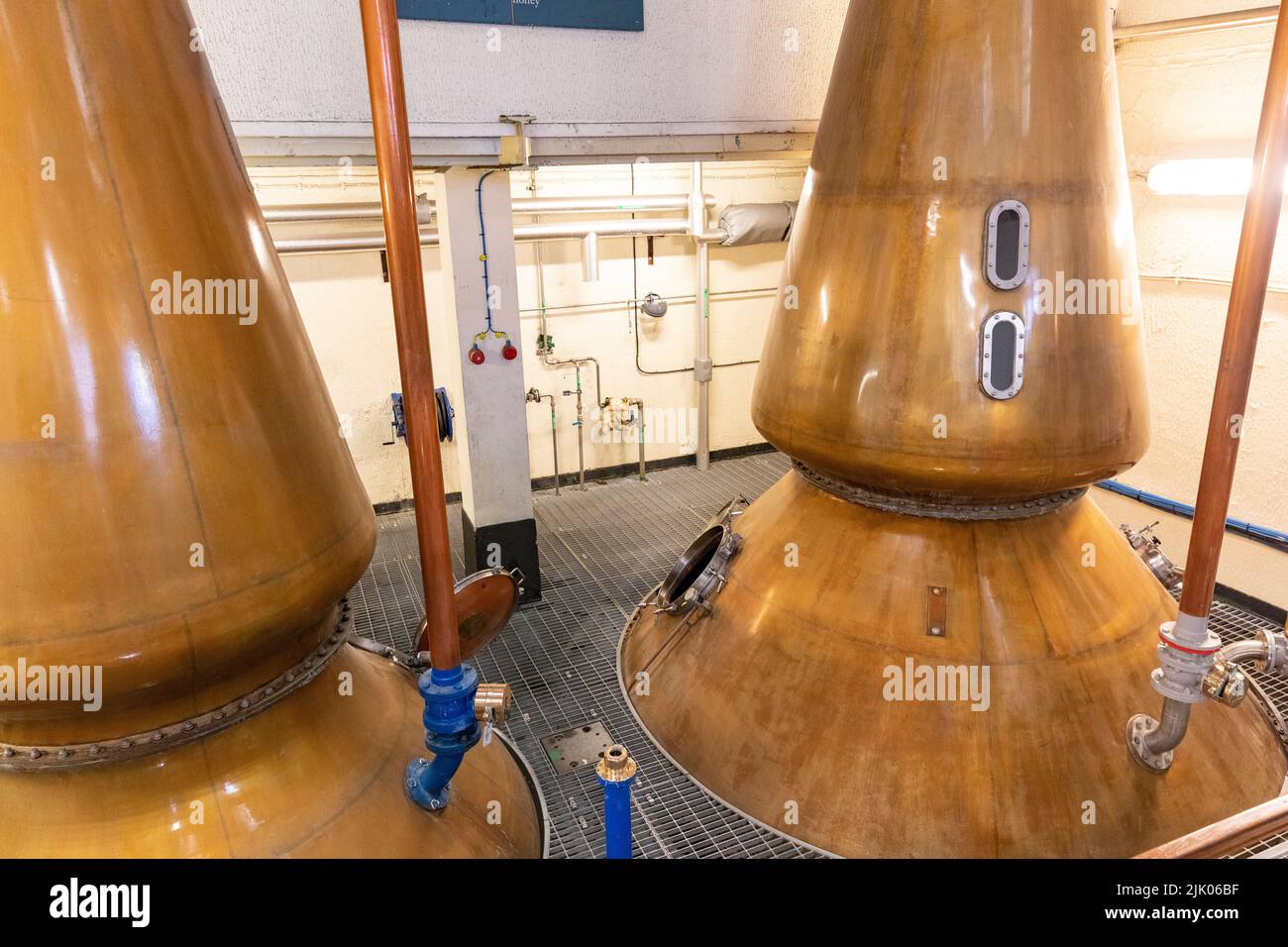 Oban whisky distillery interior and copper stills workings of the distillery to produce single malt whisky,Oban, Scottish Highlands,Scotland,UK Stock Photo