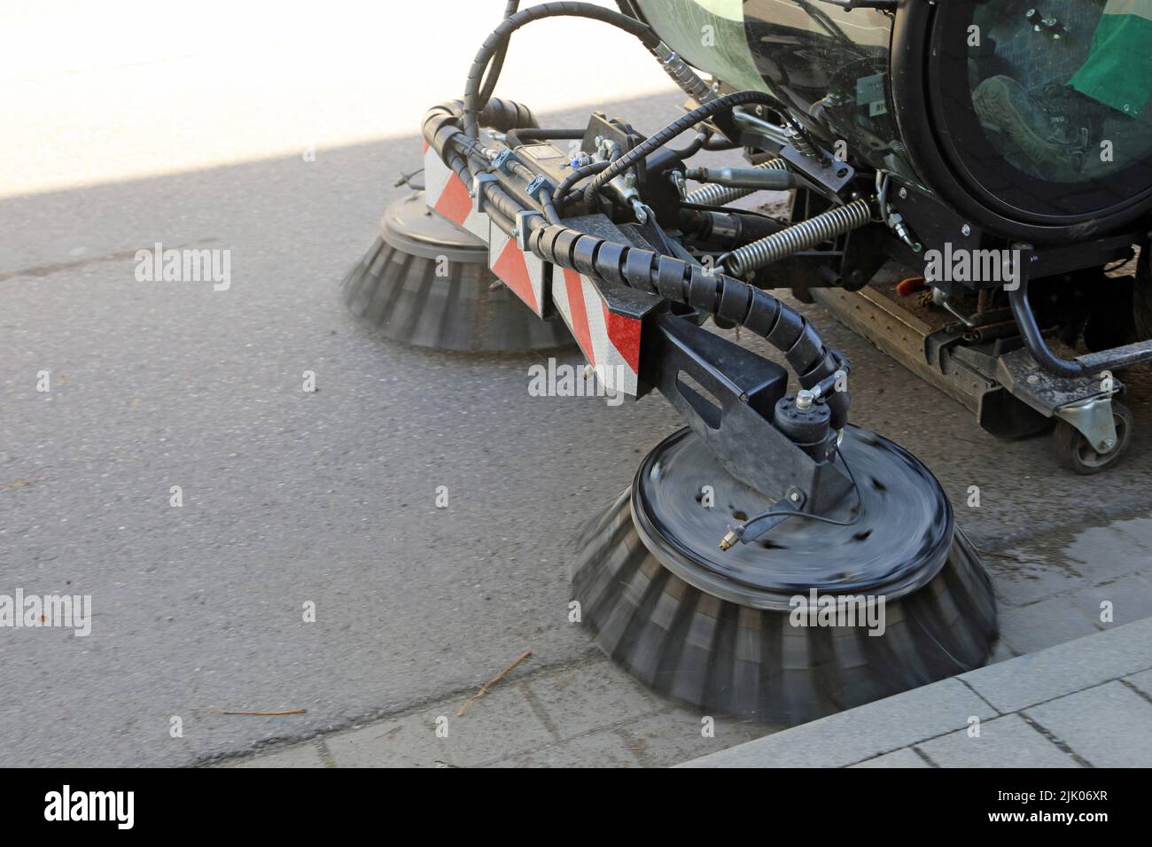 Street cleaning with sweeper Stock Photo